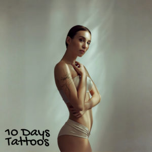 Jeune femme sexy avec tatouage semi-permanent Lotus du Vent, fin et artistique, sur l’épaule droiteVoici plusieurs créations de descriptions, titres et textes alternatifs pour les images demandées de tatouages semi-permanents variés, symboliques et artistiques. Chaque ensemble valorise un motif précis, le style utilisé, ainsi que les émotions et symboles que le tatouage exprime, tout en respectant la nature éphémère et douce des tatouages semi-permanents.