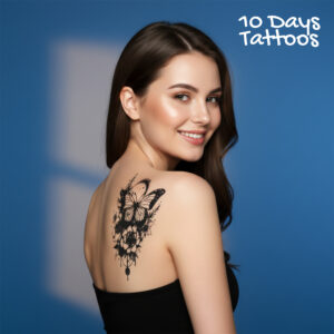 Tatouage temporaire papillon noir floral sur épaule femme 10 Days Tattoos